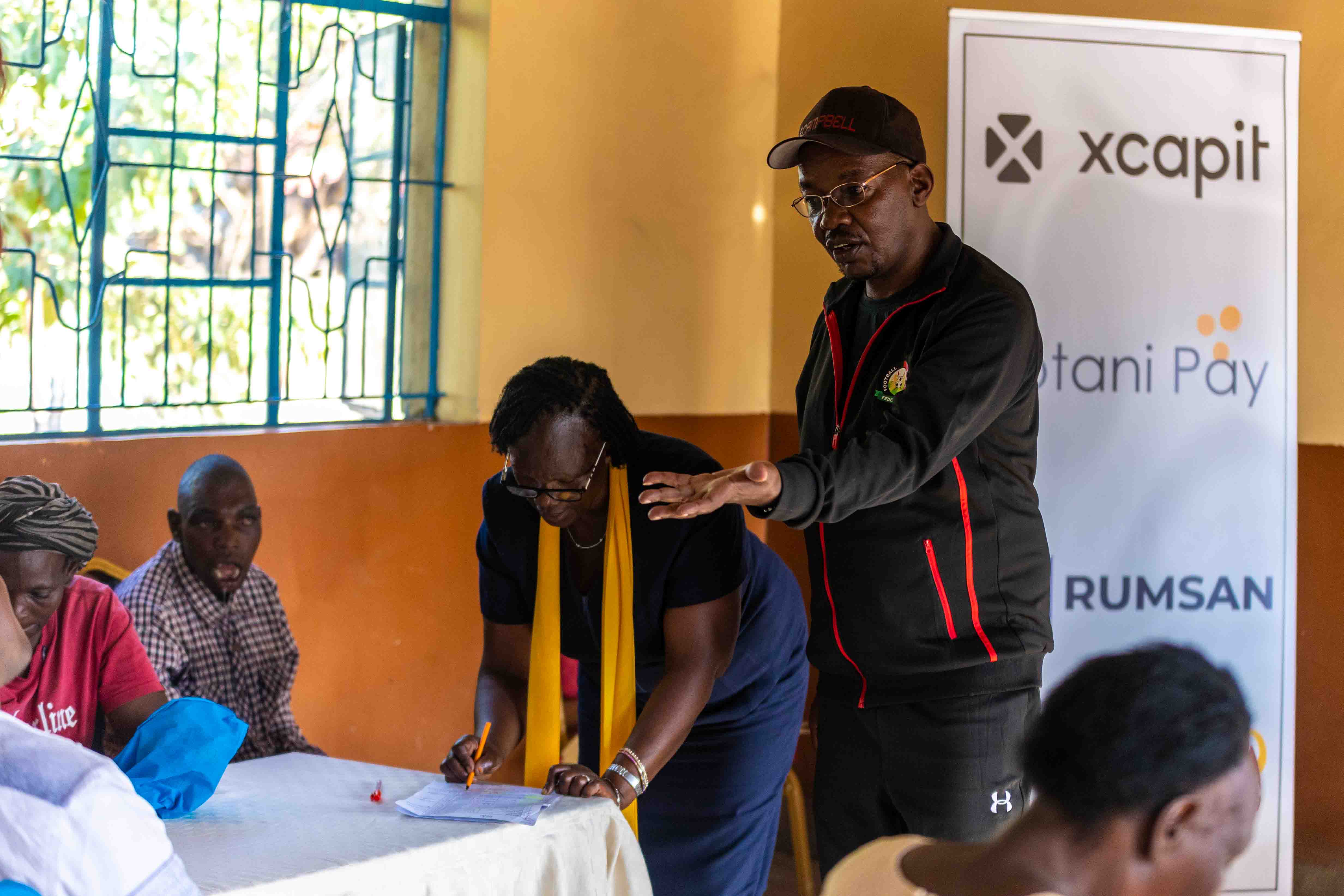 AidLink pilot training session in Kenya with Xcapit logo visible